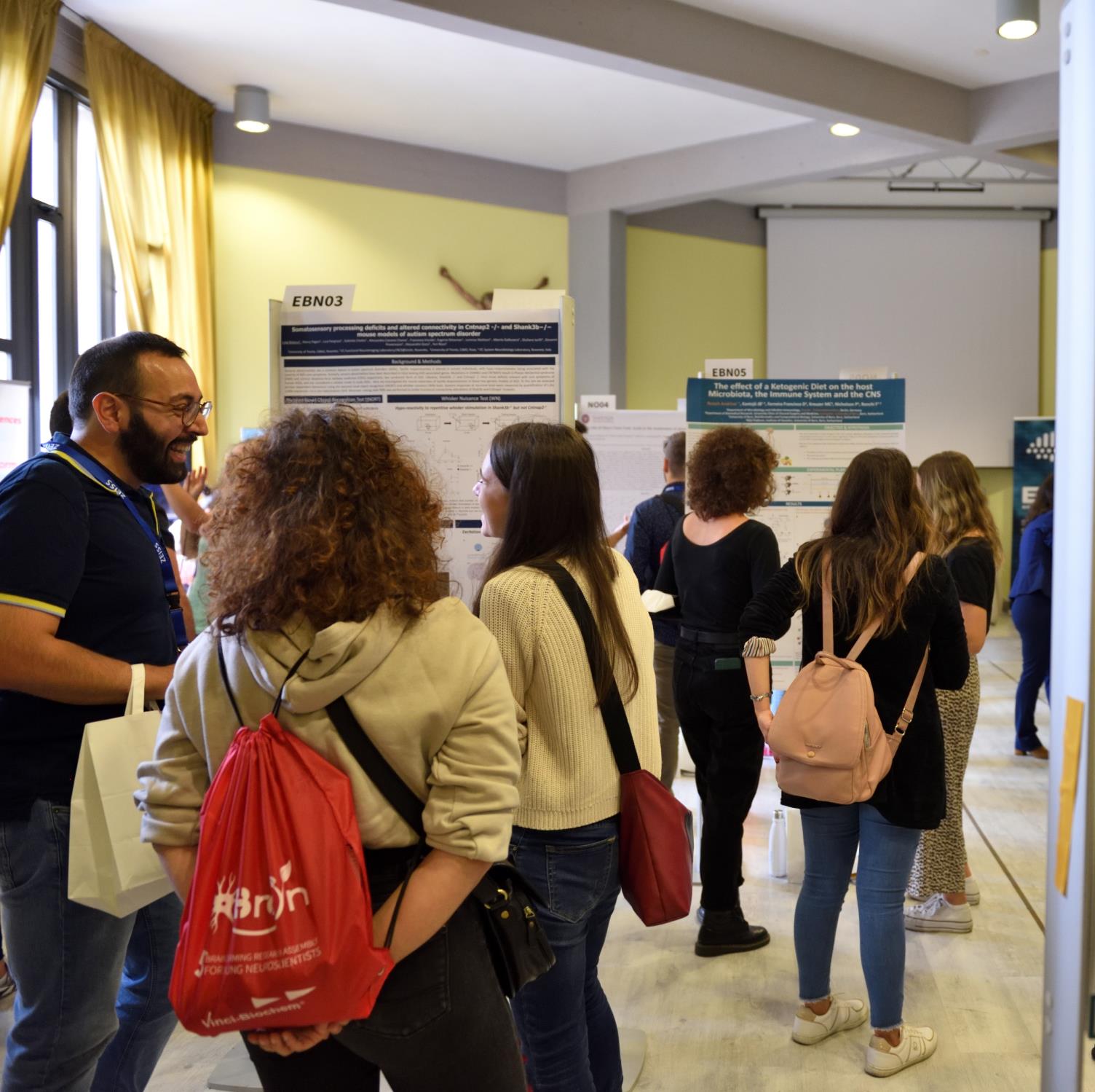 Delegates mingling during a poster session