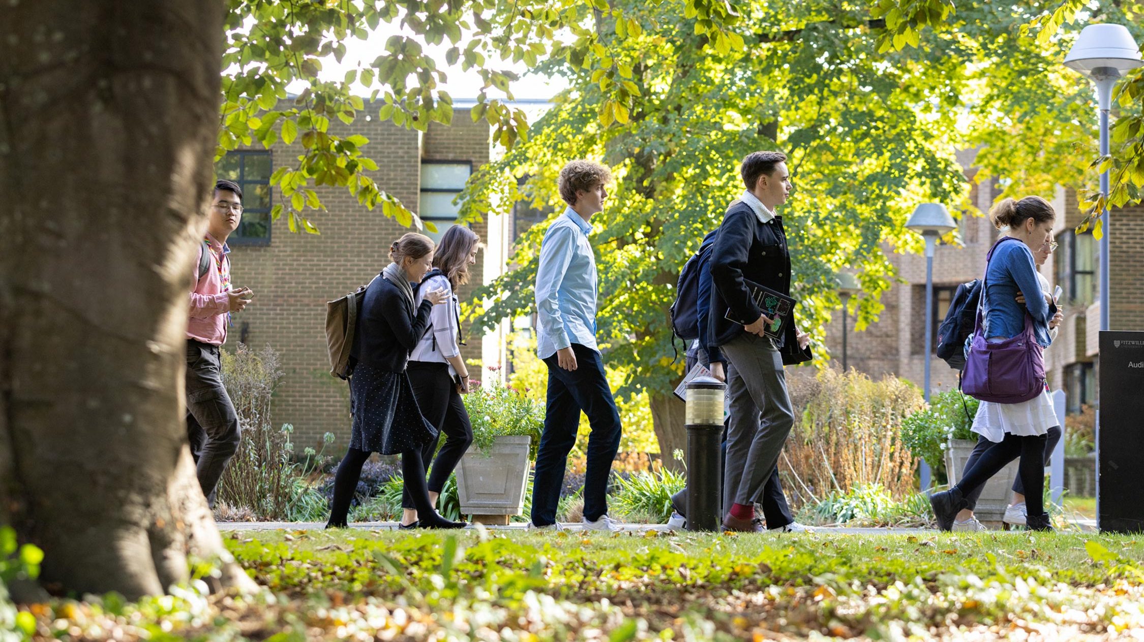 Conference delegates walking outside