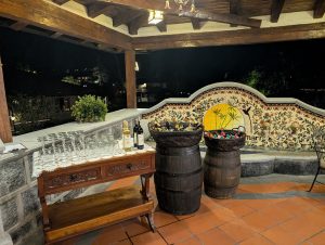 Some old barrels and containers were repurposed as drinks holders during an event.